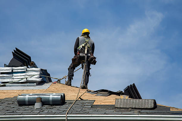 Professional Roofing technician working in Weehawken, NJ